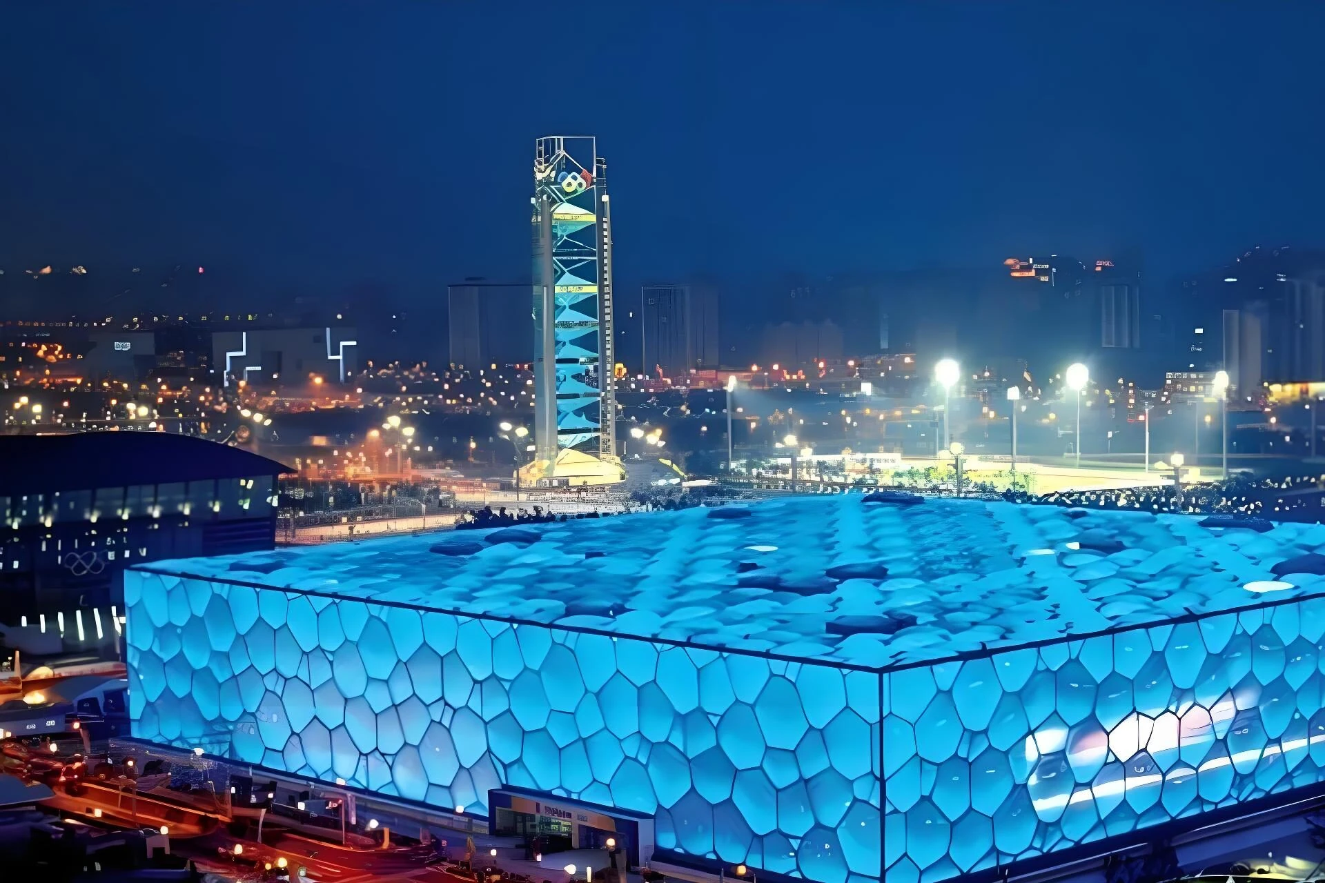 Beijing National Aquatics Center illuminated blue at night